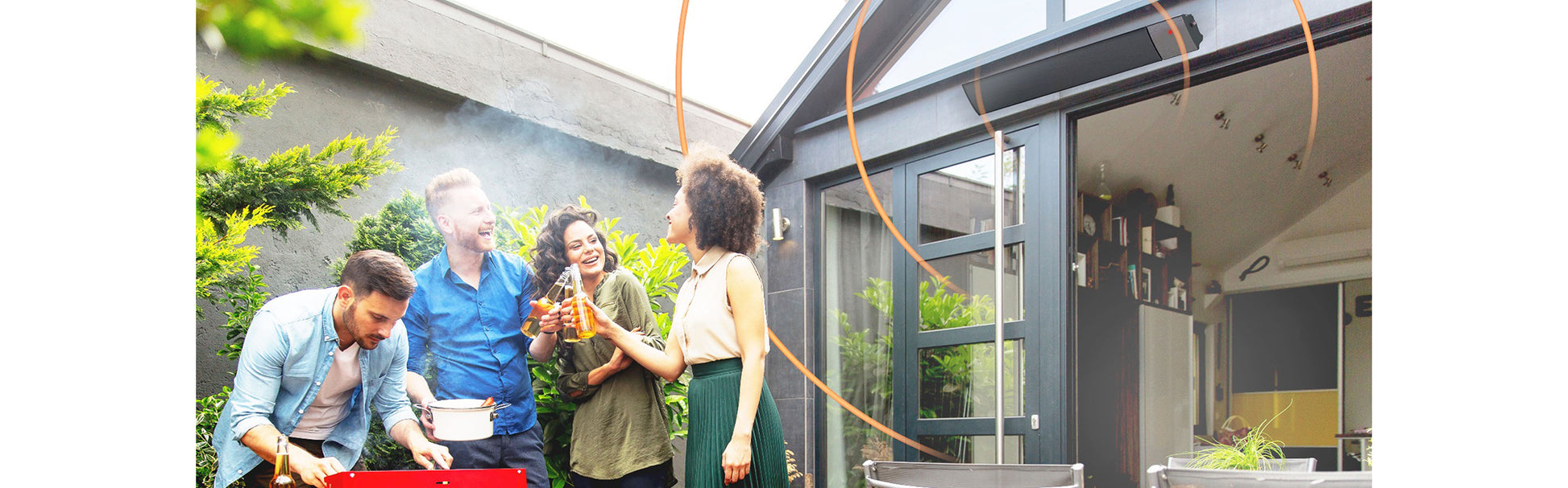 Group of people socializing and cooking outdoors in a modern backyard with 1.2kW Hellos Infrared Bar Heater on wall setting.