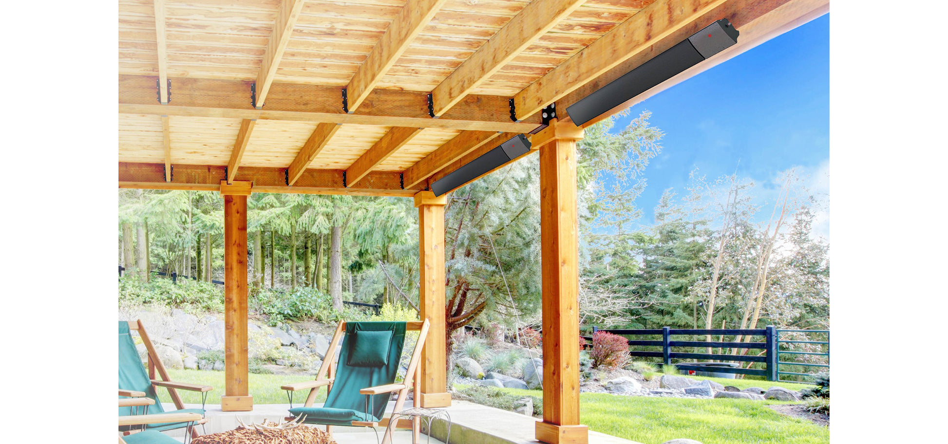Wooden pergola with outdoor furniture and a view of trees and a fence with 1.2kW Hellos Infrared Bar Heater