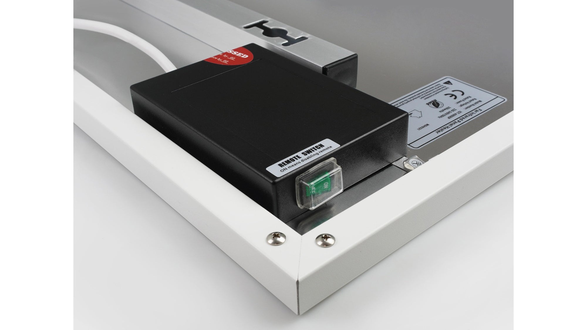 Close-up of a electronic device with a label on a white background For 900W Nexus Wi-Fi Image Infrared Heating Panel