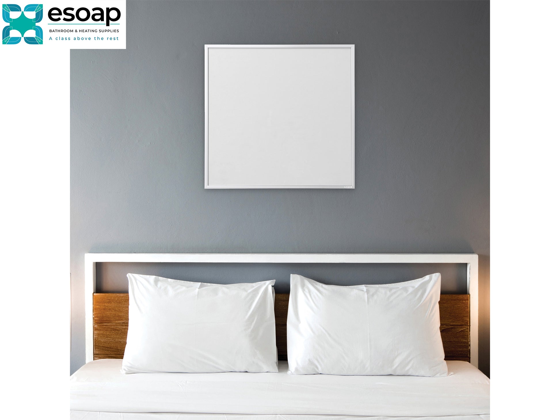 Bed with white pillows against a gray wall with a framed picture, featuring the esoap logo and wall Black 350W Classic Infrared Heating Panel