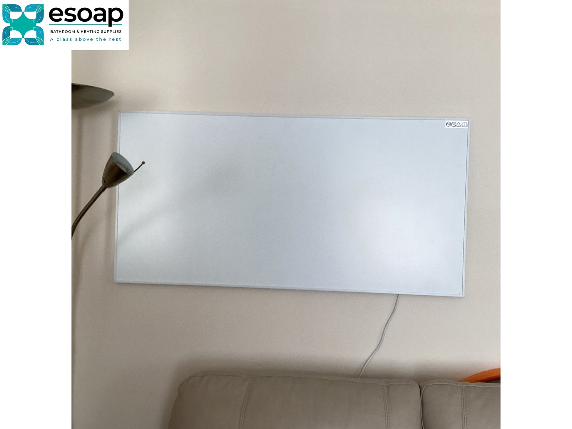 700W Classic Infrared Heating Panel Black on a beige wall with 'esoap' branding.