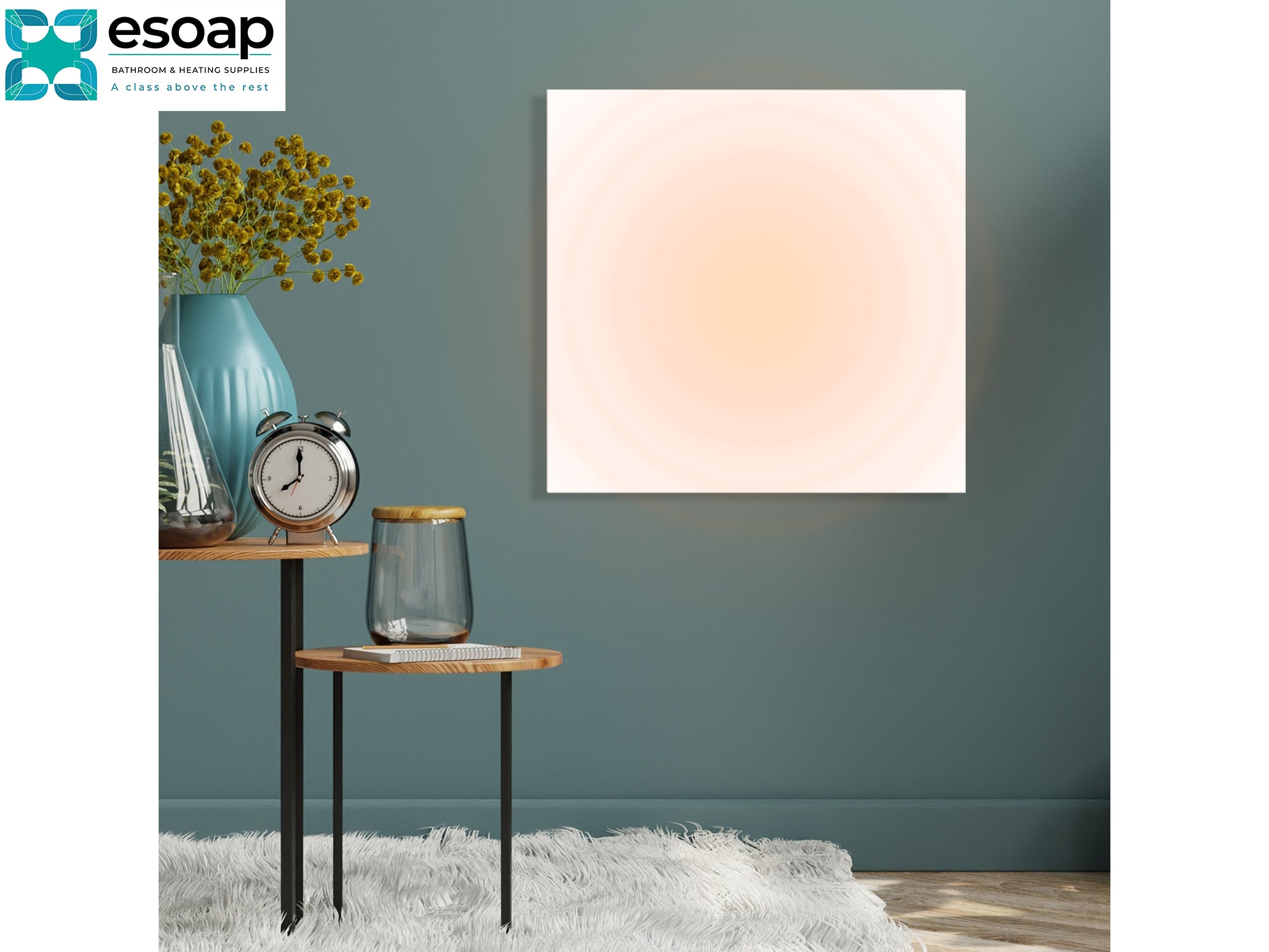 Modern interior design with a lamp, clock, and vase on a table against a gray wall and 350W Premium Frameless Infrared Heating Panel on wall