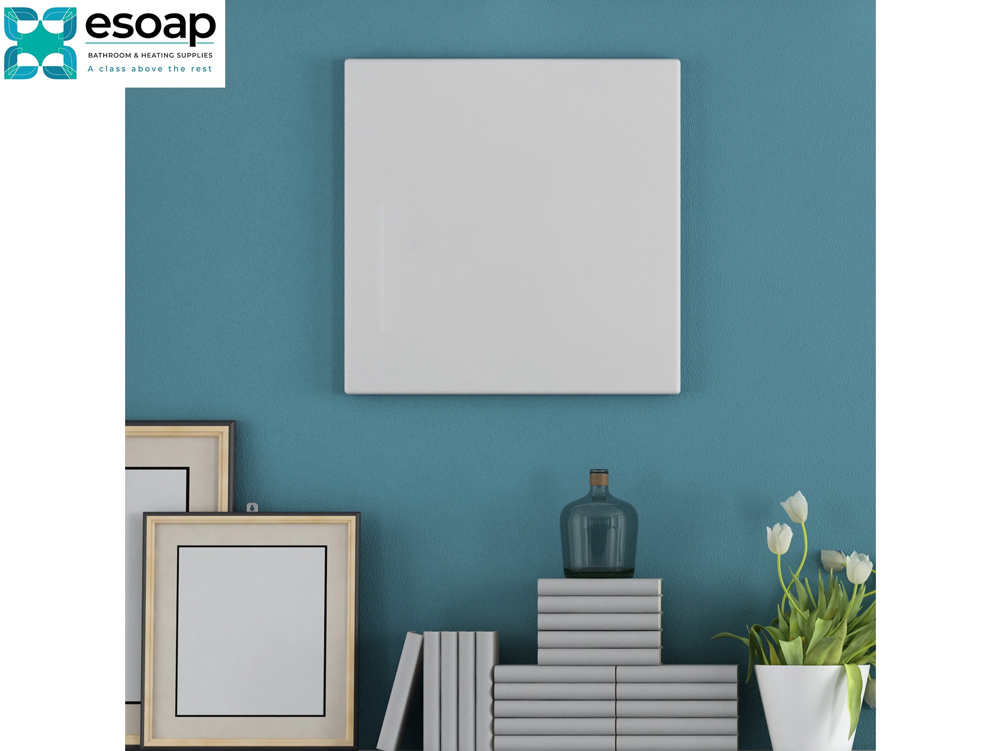 Decorative wall with framed pictures, books, a vase, and a plant against a blue wall with 'esoap' branding and 350W Premium Frameless Infrared Heating Panel on wall