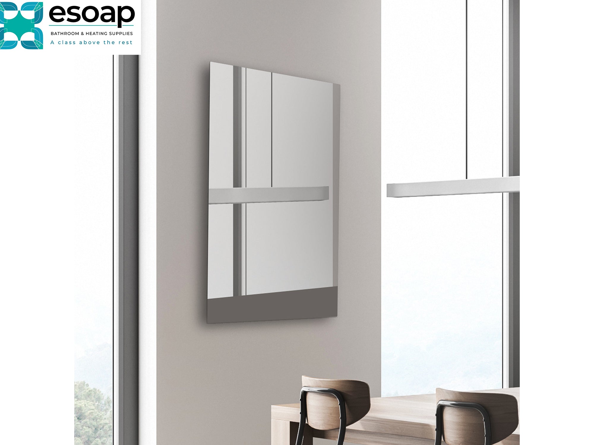 Modern wall-580W Mirrored Wi-Fi Infrared Heating Panel on a gray wall with a blurred window in the background