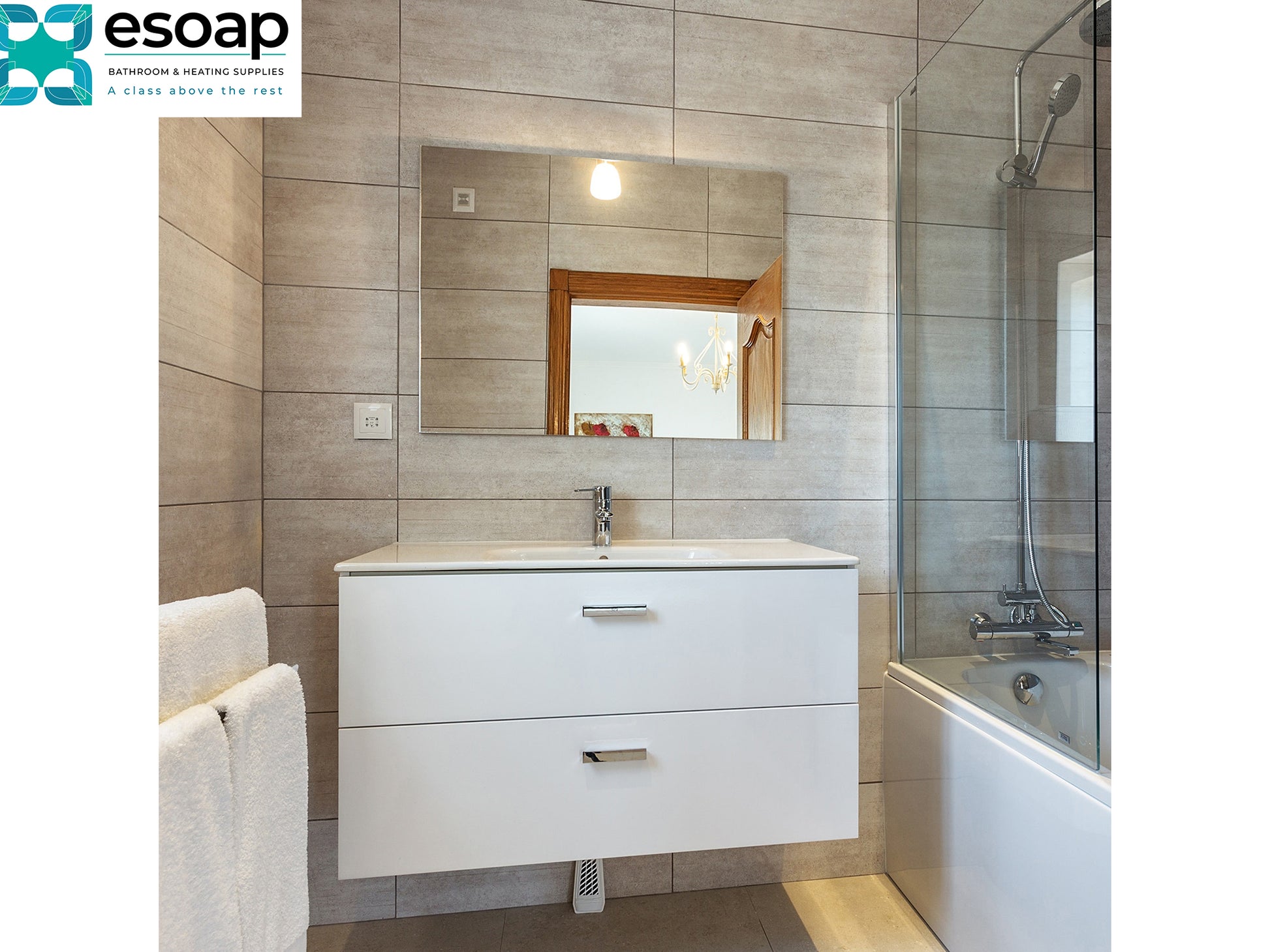 Modern bathroom with white vanity, 450W Mirrored Wi-Fi Infrared Heating Panel, and bathtub, featuring the esoap logo.