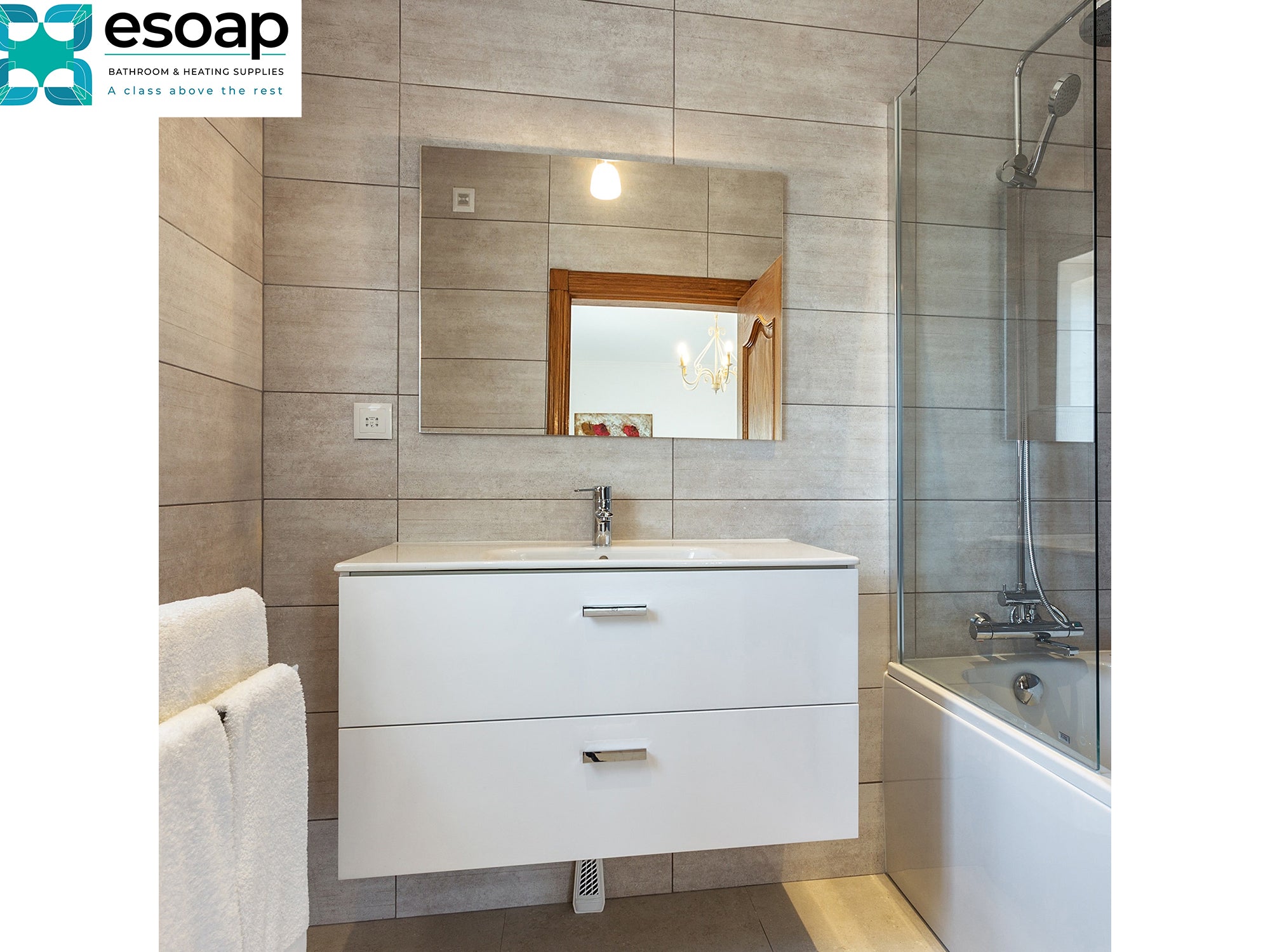 Modern bathroom with white vanity, 450W Mirrored Wi-Fi Infrared Heating Panel, and bathtub, featuring the esoap logo.