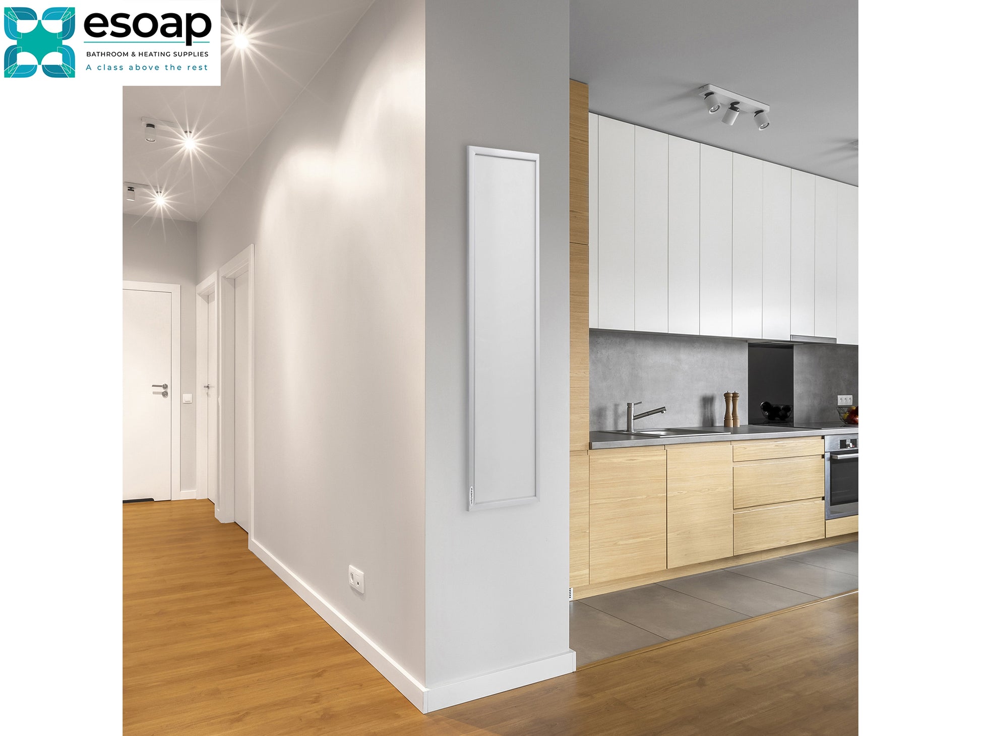 Modern kitchen with white cabinets and wooden floor, featuring the Esoap brand logo and 350W Ultra Slim NXT Gen Infrared Heating Panel on wall