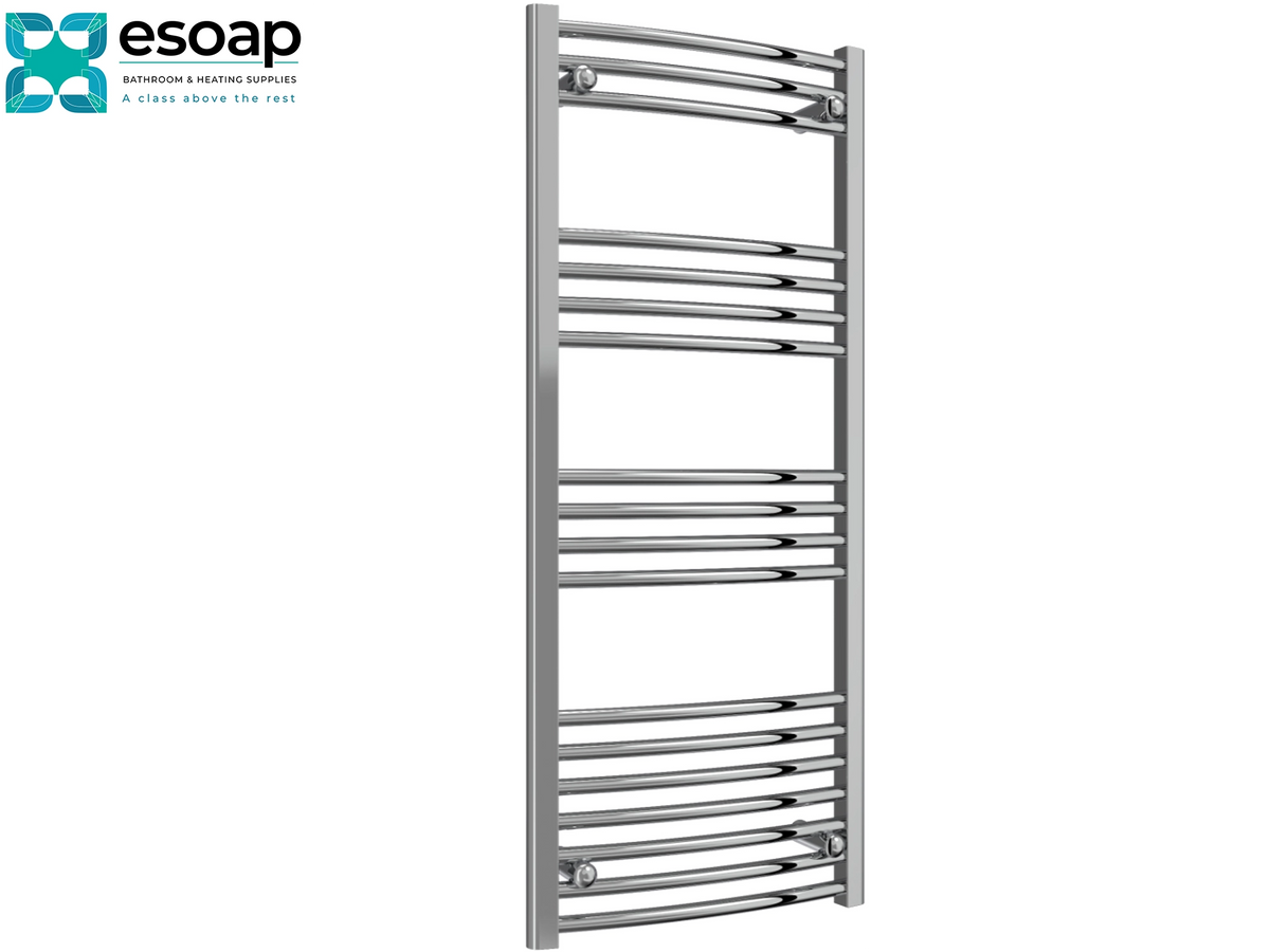 A tall, slim heated towel rail in polished silver chrome, shown against a plain white background with the Esoap brand logo in the top-left corner Reina Capo Curved 1200x500 Chrome Towel Rail