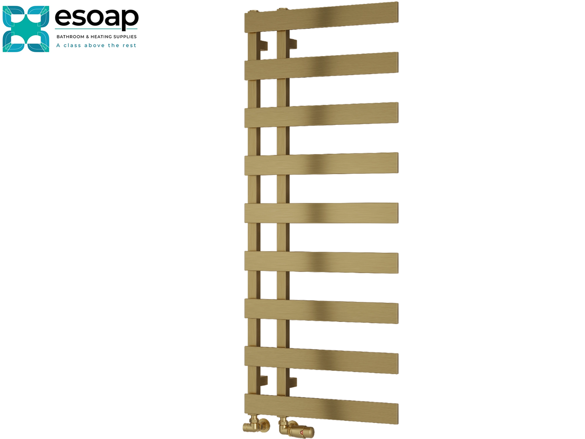 A tall, narrow gold-colored heated towel rail with horizontal bars and brass valve connectors at the bottom, shown on a plain white background with the Esoap logo in the top-left corner Reina Florina 1235x500 Brushed Brass Designer Radiator