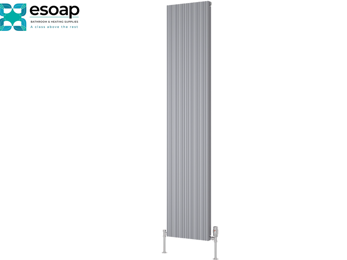 A tall, narrow vertical radiator in a metallic silver finish, shown against a plain white background with the Esoap brand logo in the top-left corner. Reina Melvin 1800x360 Silver Designer Radiator